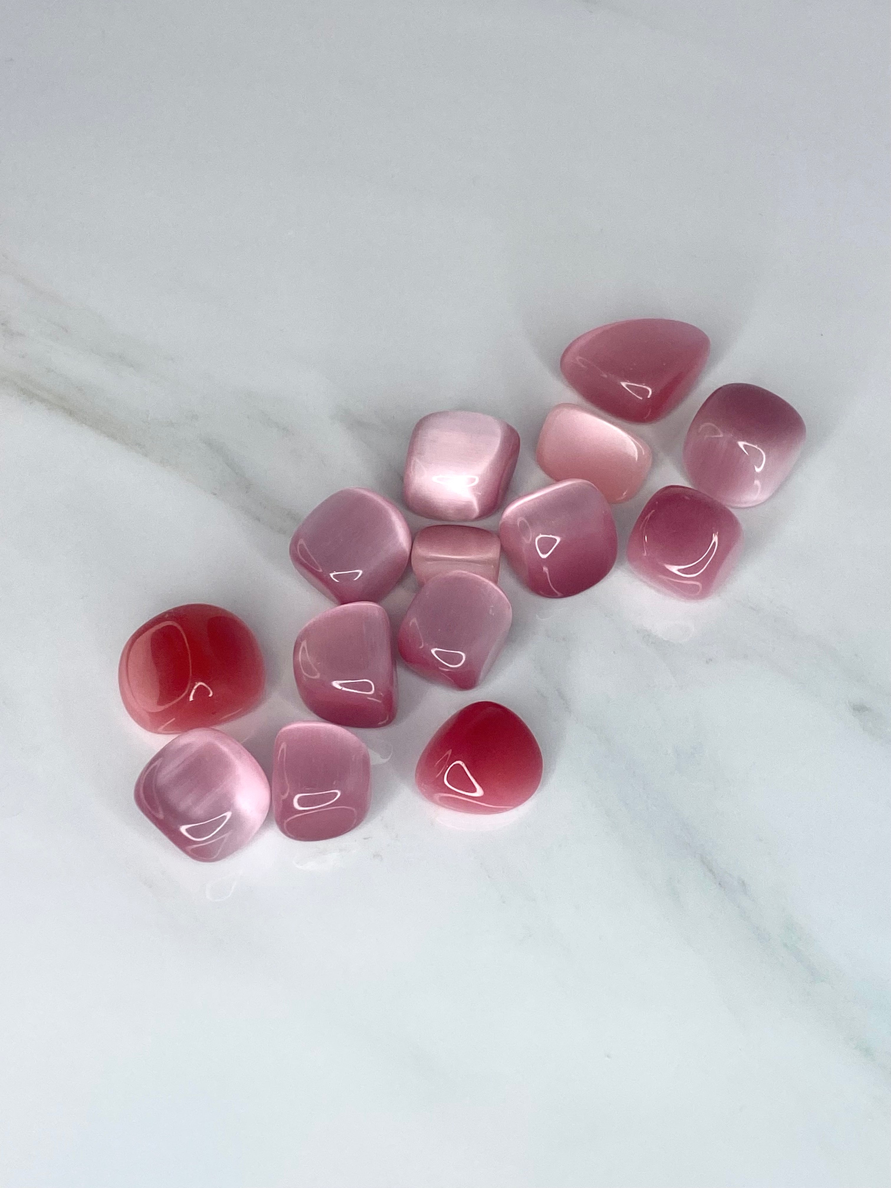 Pink cats clearance eye stone meaning